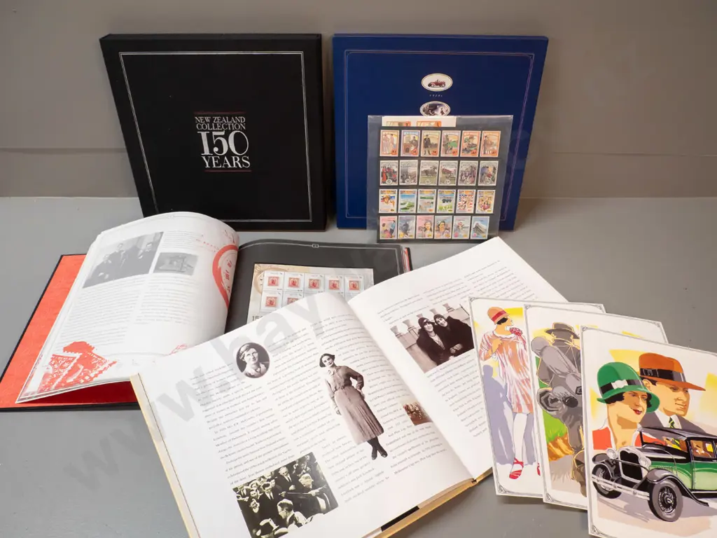 2 New Zealand postage stamp slip-cased collector volumes - 'The Emerging Years 1920s-1950' & '150 Years of Stamps' Image 1++