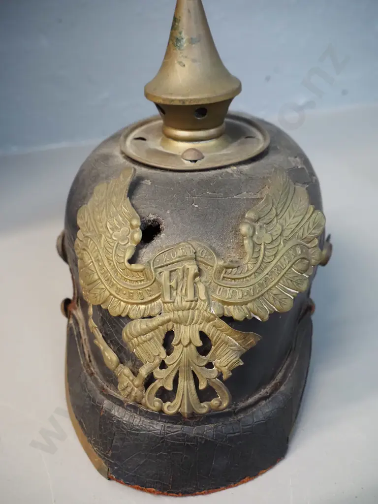 WWI era German "Pickelhaube" leather and brass helmet - very small size, has wear and some damage Image 1++