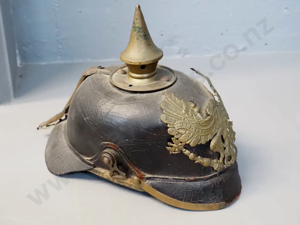 WWI era German "Pickelhaube" leather and brass helmet - very small size, has wear and some damage Image 1++