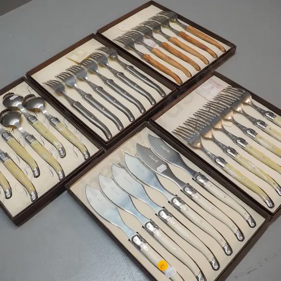 5 cased sets French 'Laguiole' cutlery - composite, olive wood or stainless steel handles