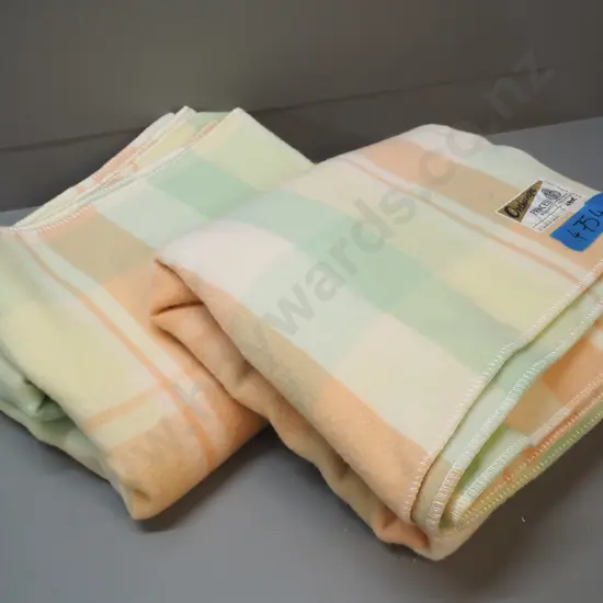 pair of Onehunga Princess all-wool check blankets - one with label, one without