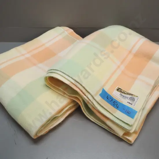 pair of Onehunga Princess all-wool check blankets - one with label, one without