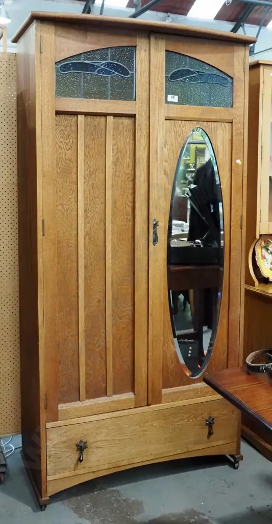 deco oak 2-door 1 drawer wardrobe w/leadlight windows, bevelled mirror, on casters H2050 W1020 D530 Image 1++