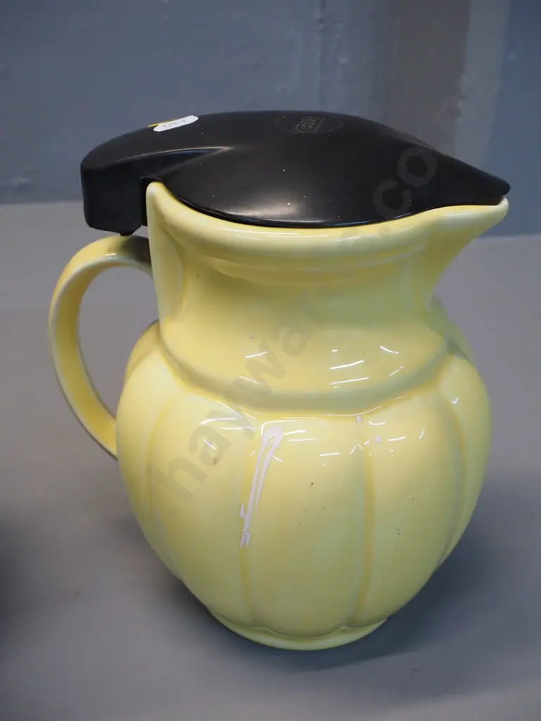 2 ceramic electric jugs - yellow Neeco w/bakelite lid, some paint residue, & Temuka mottled brown w/swivel ceramic lid Image 1++