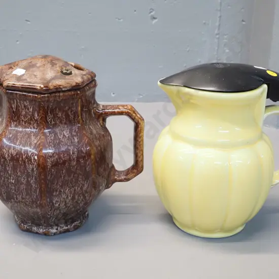 2 ceramic electric jugs - yellow Neeco w/bakelite lid, some paint residue, & Temuka mottled brown w/swivel ceramic lid
