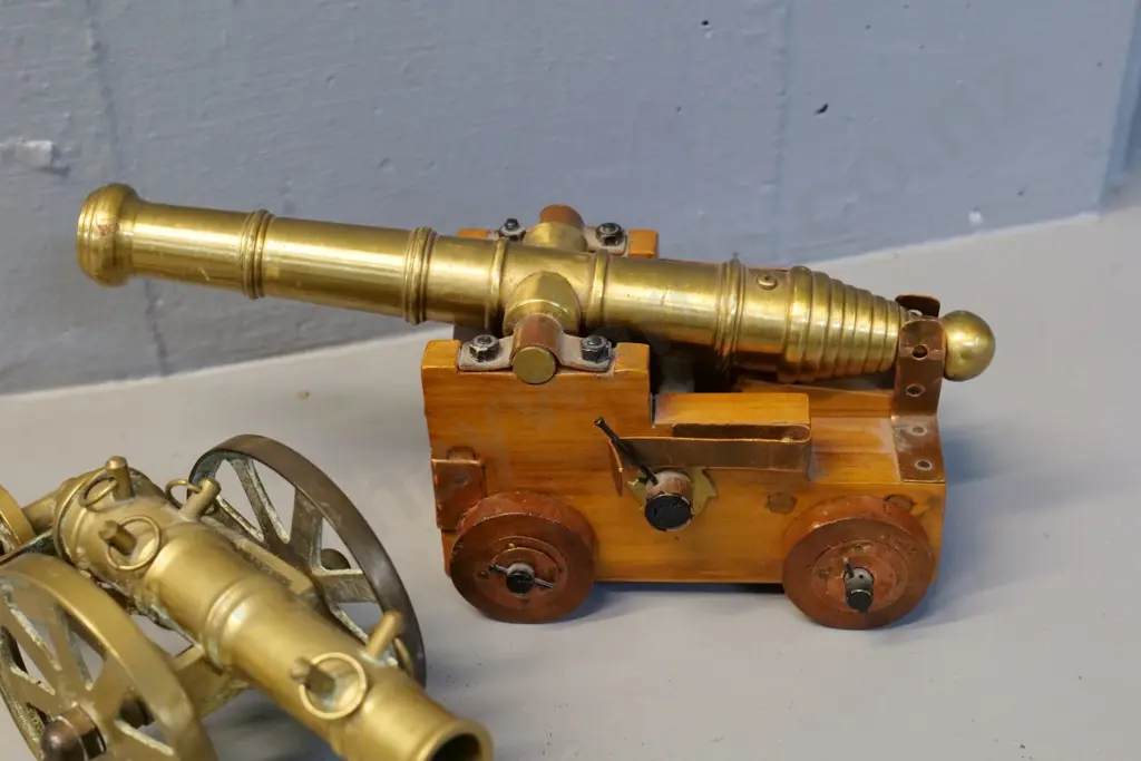 2 small brass model cannons, one  all brass and one with wooden base H-100 L-220 Image 1++