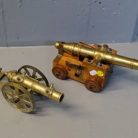 2 small brass model cannons, one  all brass and one with wooden base H-100 L-220