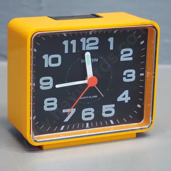 retro orange plastic cased Rhythm quartz alarm clock H-90 W-105