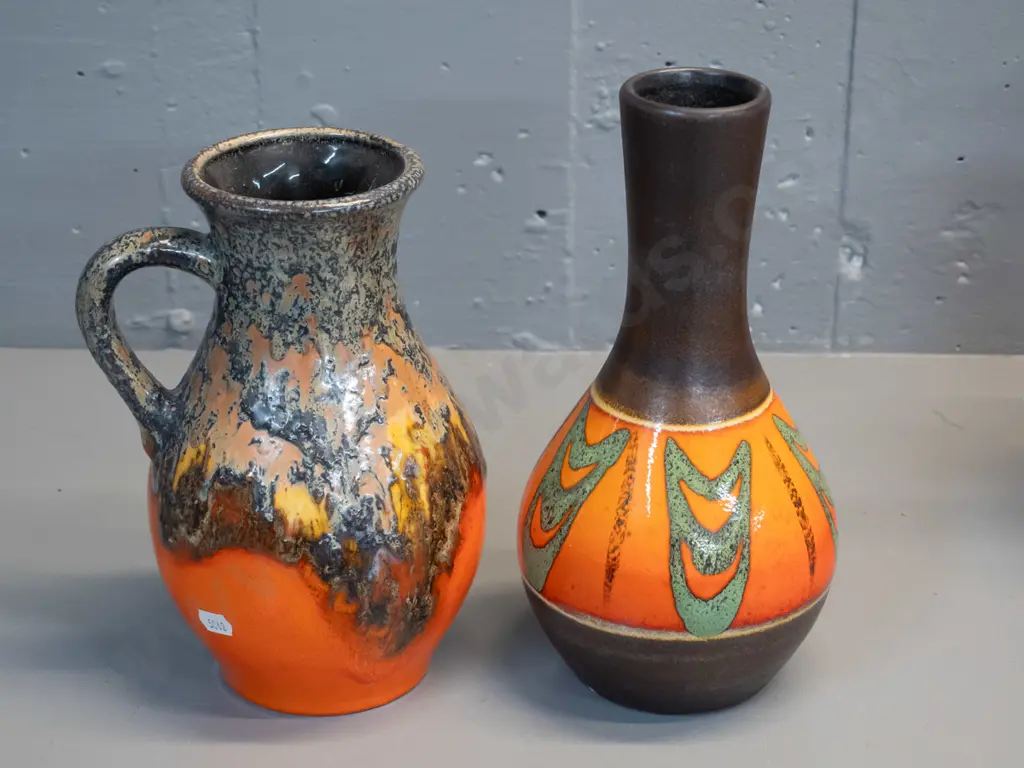 2 German pottery vases - orange and brown glazes, handled one with drip glaze, taller has small fleck H260 Image 1++