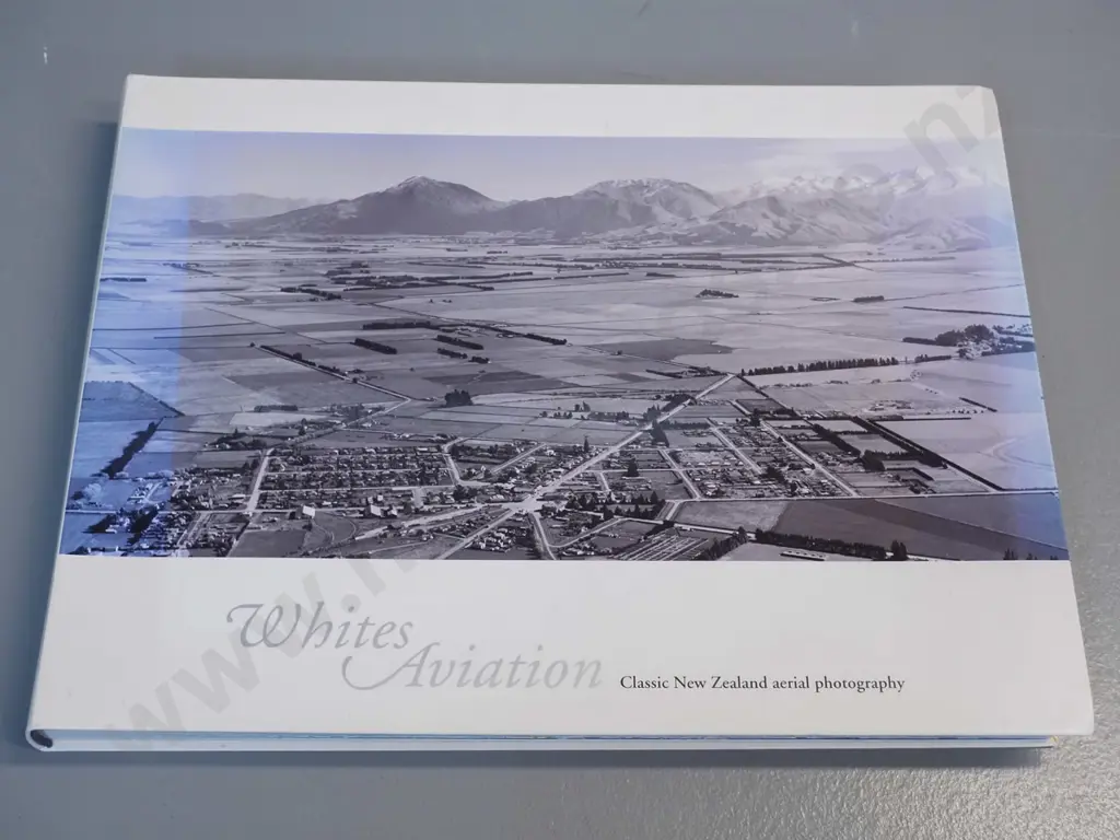 book - Whites Aviation aerial photographs, published 2009 Godwit press - some fading to cover Image 1++