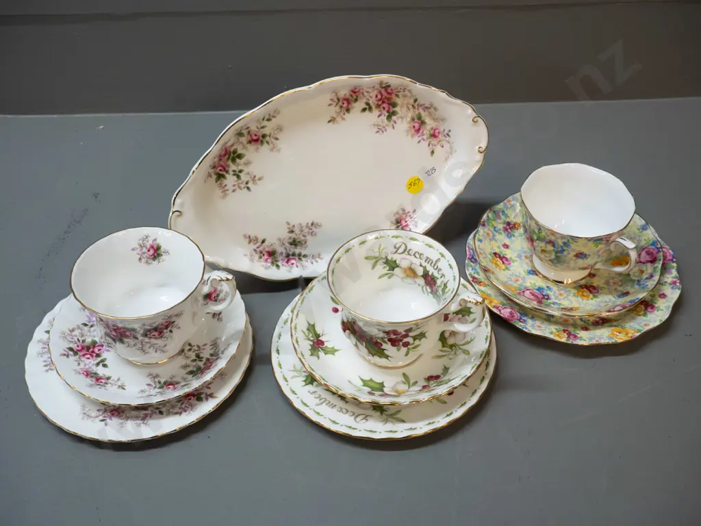 4 pieces Royal Albert china - Lavender Rose biscuit plate & trio, Christmas Rose trio, and an AOF trio Image 1++