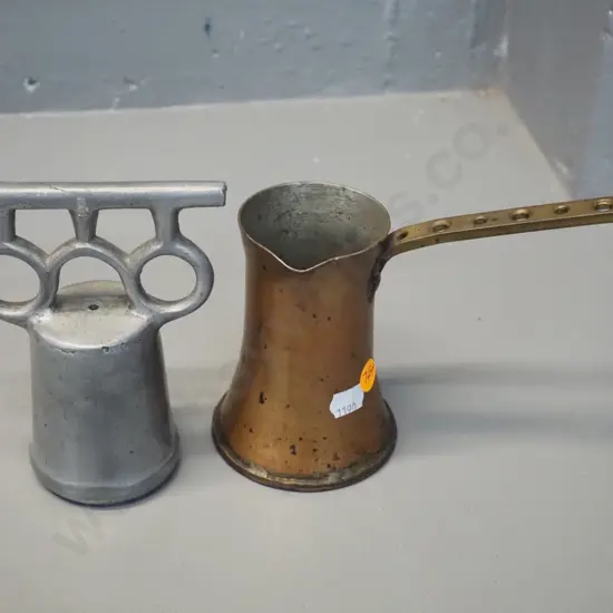 copper and brass pouring jug made from shell casing and a cast metal tool with rubber insert H-150