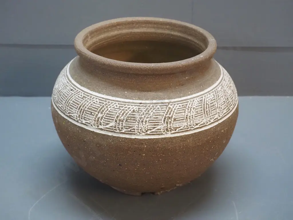 unglazed pottery jardiniere with unknown 'W' mark on base H-240 Diameter 300 at widest Image 1++