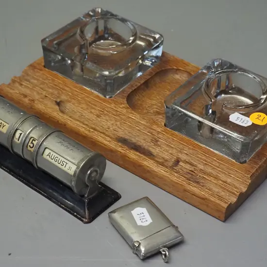 oak desktop inkwell set w/2 glass inkwells, desk calendar w/gift engraving 1947 & a plated vesta case and