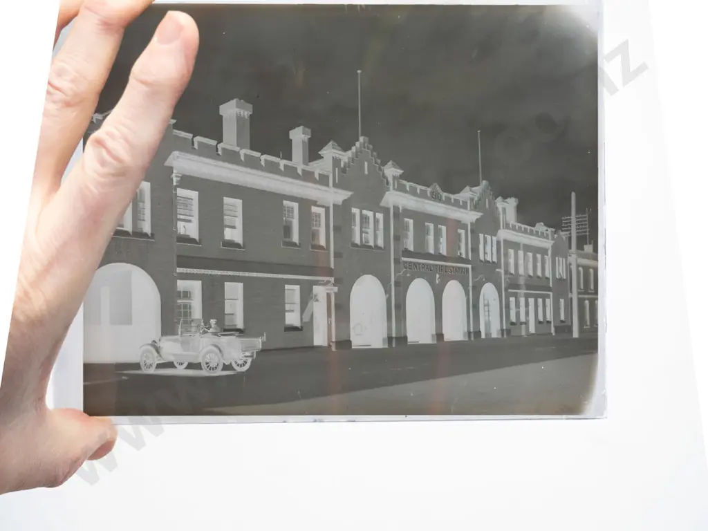 21 glass plate negatives in wooden case, full plate 160 x 215. Early Dunedin views, fire station, group photos etc. Image 1++