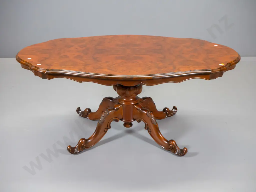 reproduction burr walnut oval scalloped-edge coffee table w/carved pedestal base H530 L1200 W690 Image 1++