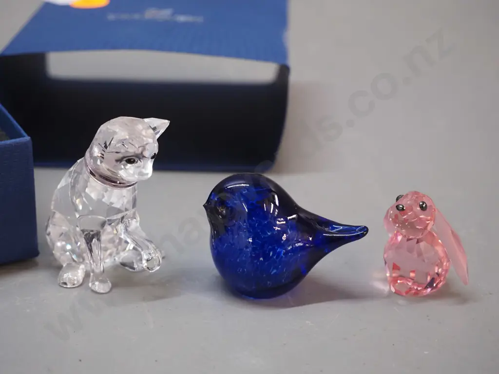 3 Swarovski crystal items - boxed duck w/3 ducklings, cat and rabbit - and a small marbled blue glass bird Image 1++