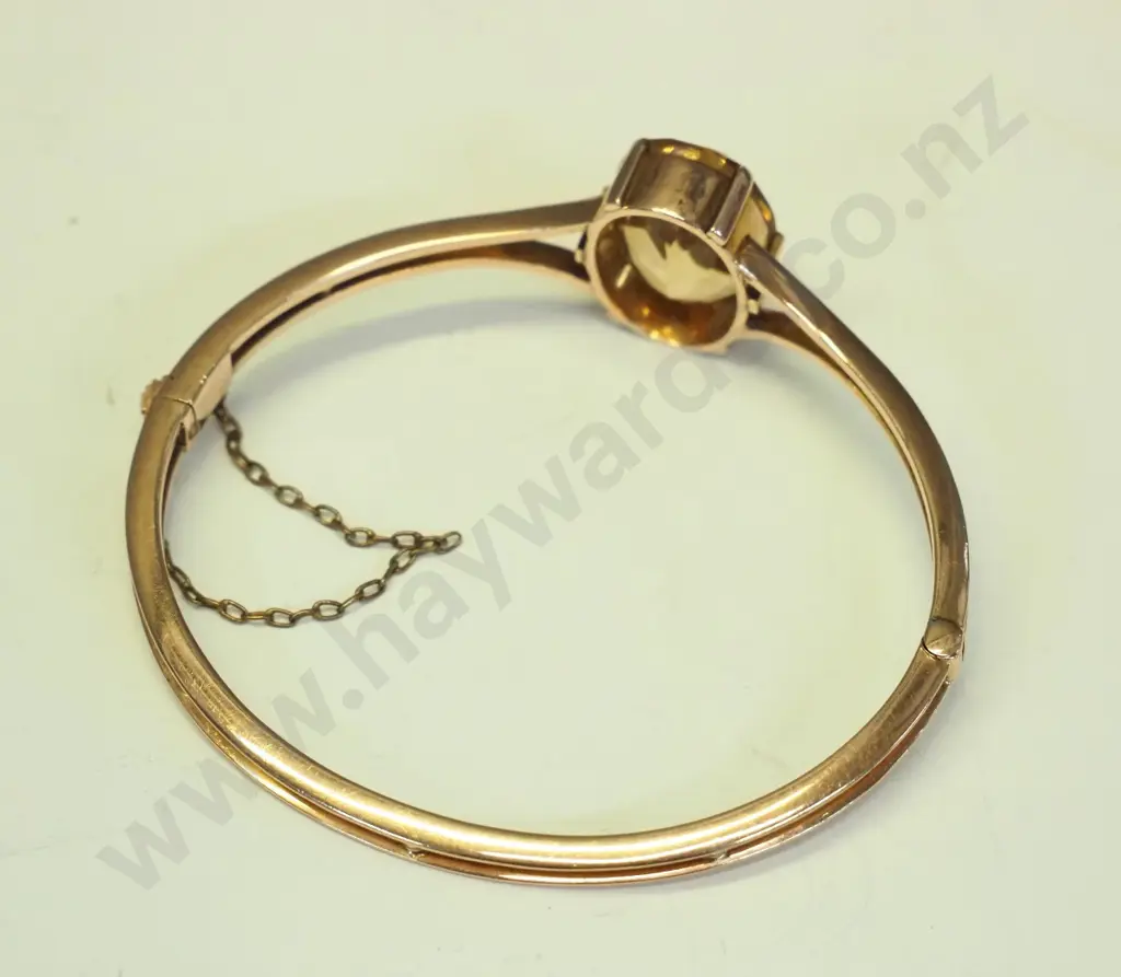 9ct amber bangle with safety chain Image 1++