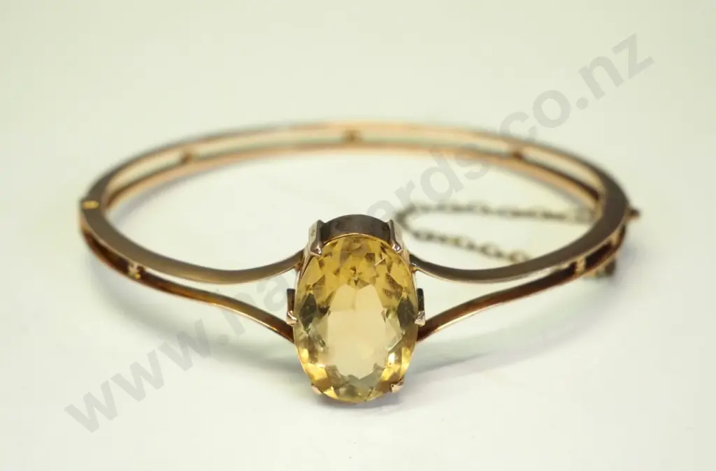 9ct amber bangle with safety chain Image 1++