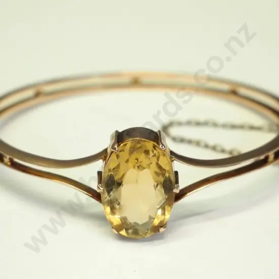9ct amber bangle with safety chain