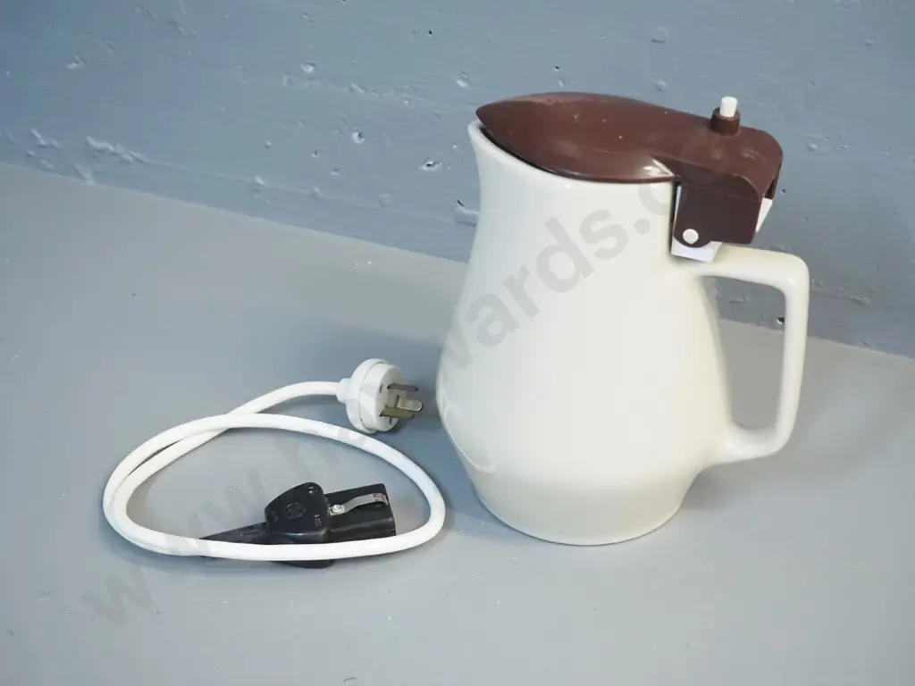 ceramic electric jug with element and lead - hard to read marks on base, plastic lid marked Guilford Sydney Image 1++