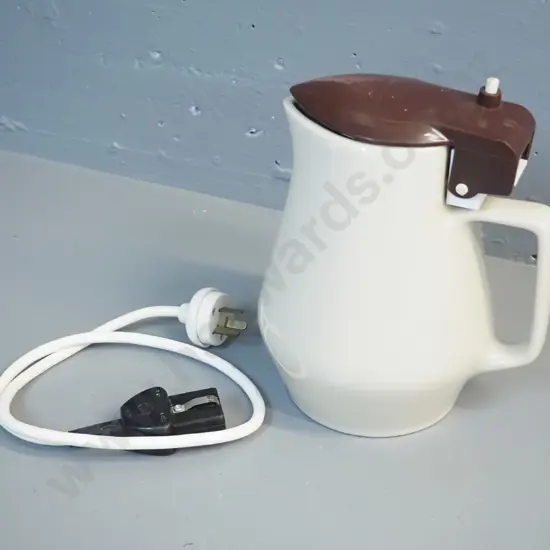 ceramic electric jug with element and lead - hard to read marks on base, plastic lid marked Guilford Sydney