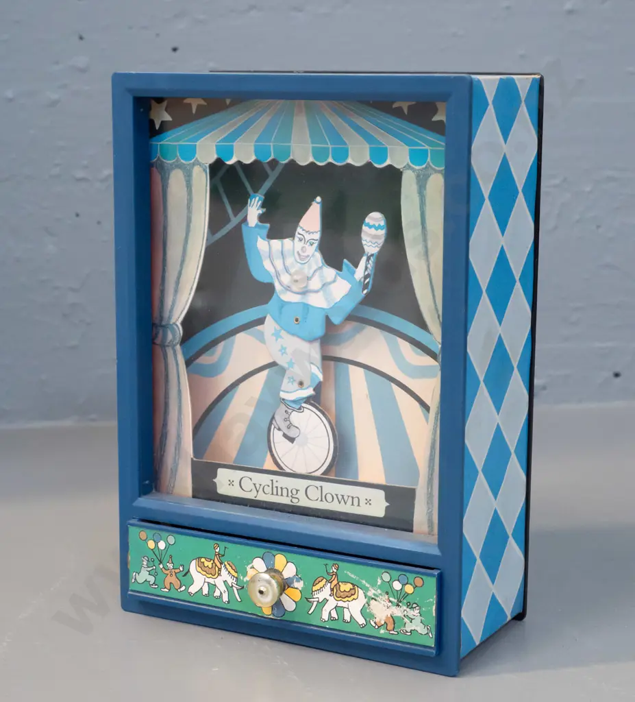 plastic cased wind-up music box - cycling clown moves when drawer is pulled out H-190 W-130 D-65 Image 1++