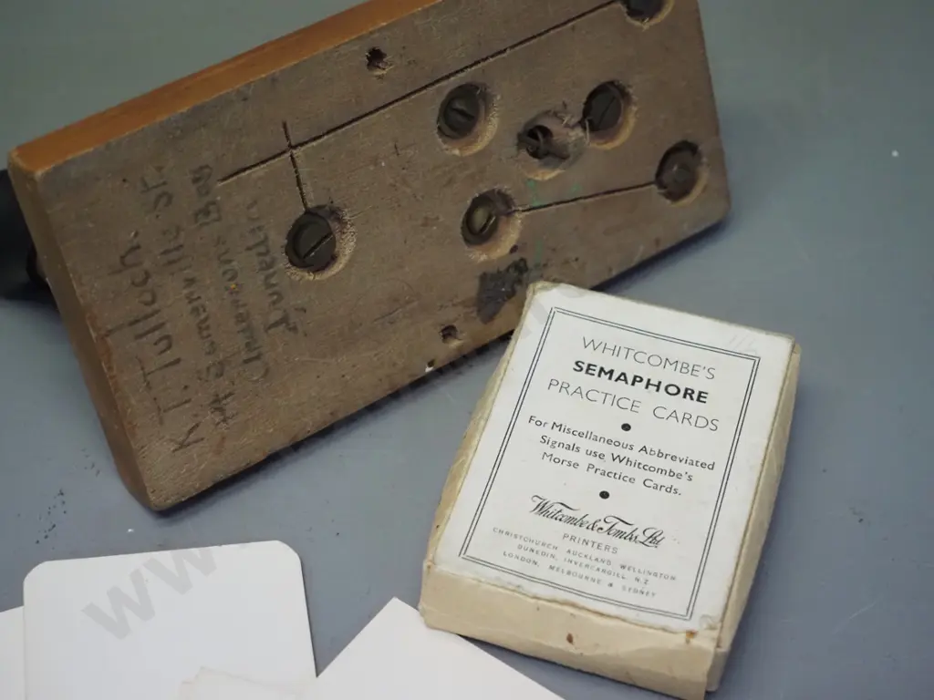vintage morse key on wooden base and a pack of semaphore signal training cards Image 1++