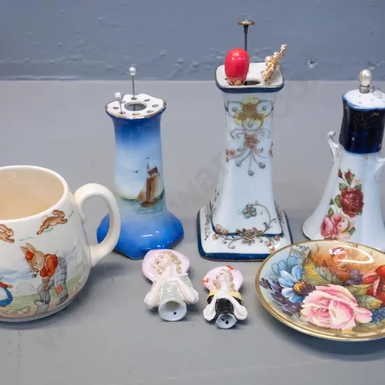 Aynsley pin dish, 2 small half dolls, a Bunnykins mug and 3 hat pin holders with assorted hat pins - tallest is H-130