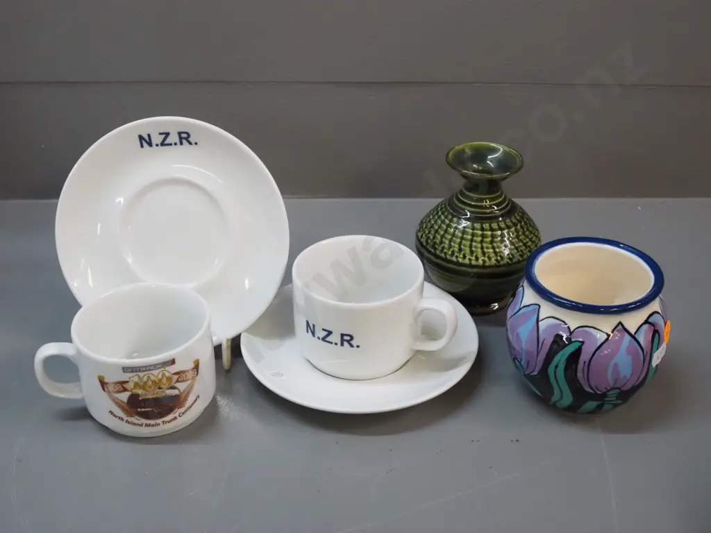 2 NZR 2008 Main Trunk Line Centenary cups & saucers (Crown Lynn Malaysia) & a Paul Welsh and 1 other NZ pottery vase Image 1++