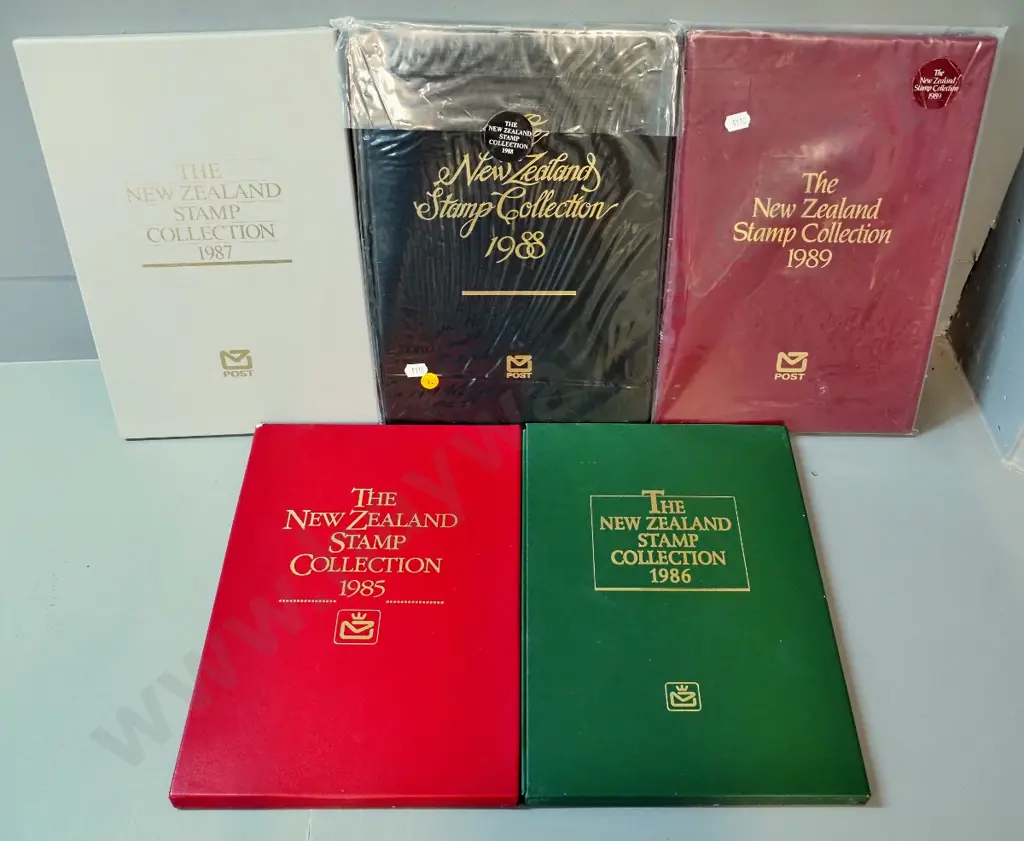 5 slip-cased New Zealand stamp annual collections - 1985 thru 1989 Image 1++