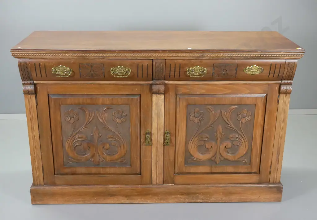 deco rimu sideboard with 2 carved doors, 2 drawers w/original drop handles, one missing drop H950 W1510 D540 Image 1++