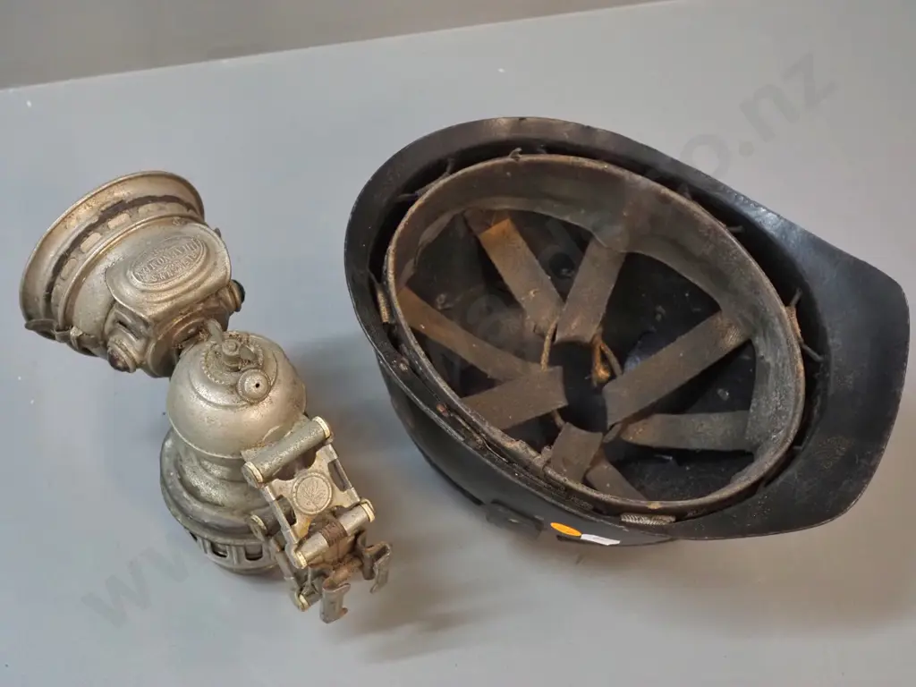 fibre miner's helmet and a vintage Riemann's Phaenomen bicycle lantern Image 1++