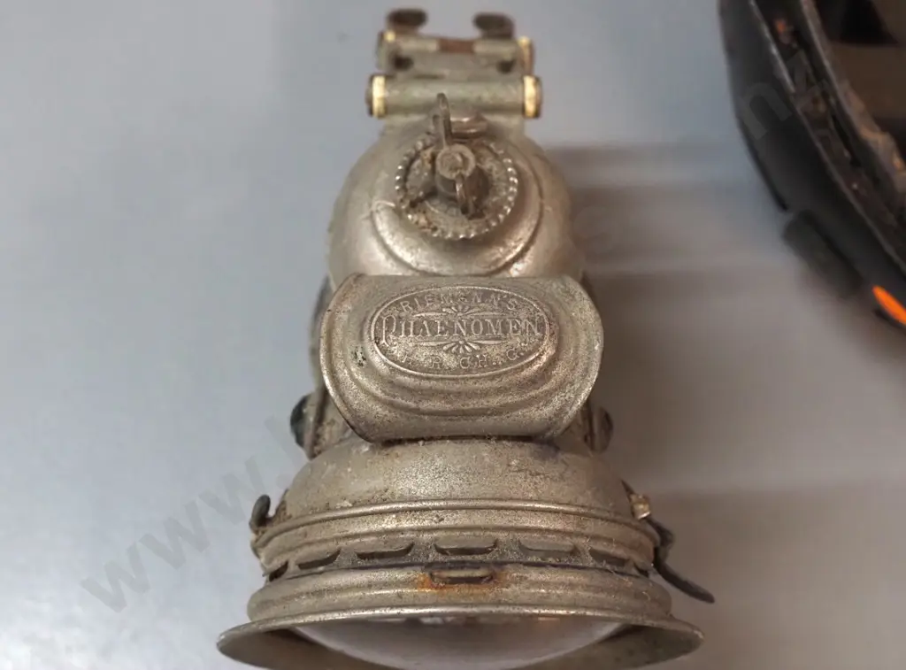 fibre miner's helmet and a vintage Riemann's Phaenomen bicycle lantern Image 1++
