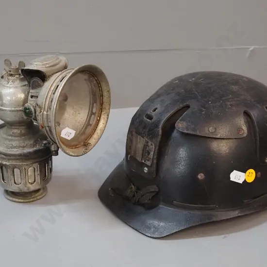 fibre miner's helmet and a vintage Riemann's Phaenomen bicycle lantern