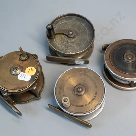 4 small metal fishing reels, one missing knob, wear and tear to others, all approx. Diameter 70