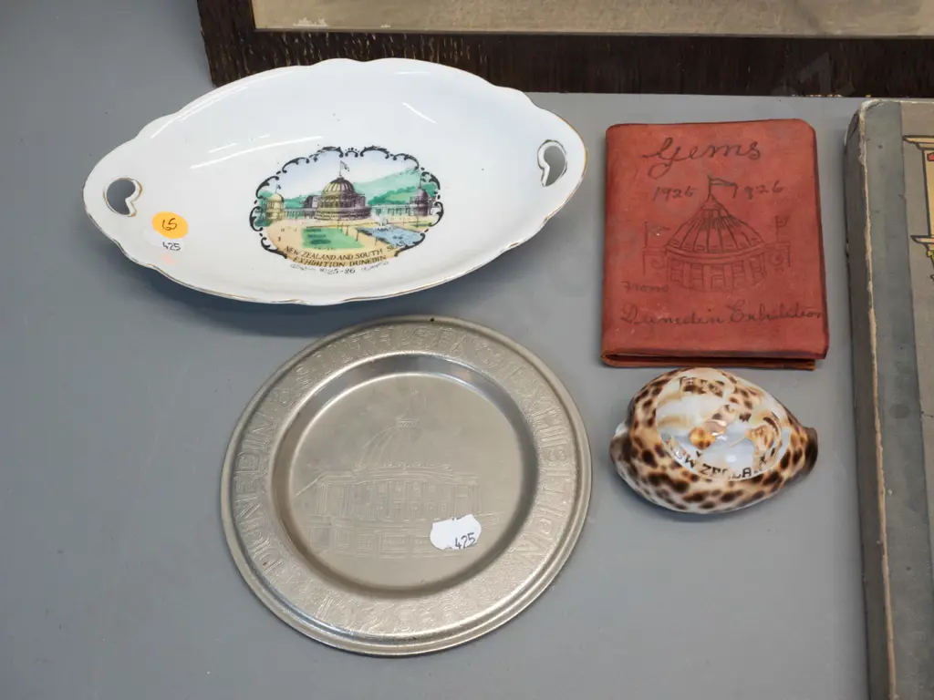 assorted souvenir items from 1925-26 Dunedin Exhibition including photo, large book, dish, etc. plus engraved shell Image 1++