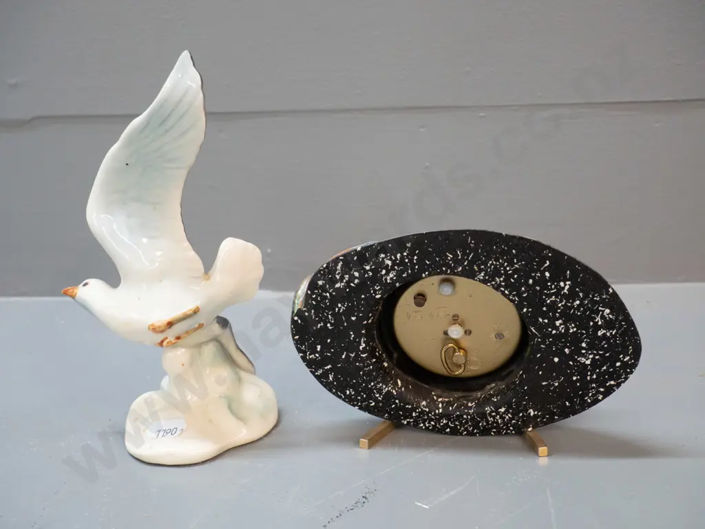 small German seagull figurine H-170 and a paua and brass clock with Europa movement Image 1++