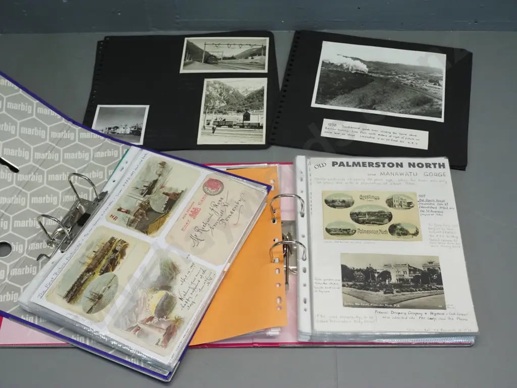 2 albums of NZ postcards - some old, very detailed annotation, some are copies - and some sheets of 1950s railway photos Image 1++