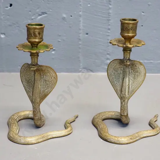 pair of small brass cobra candlesticks H-160