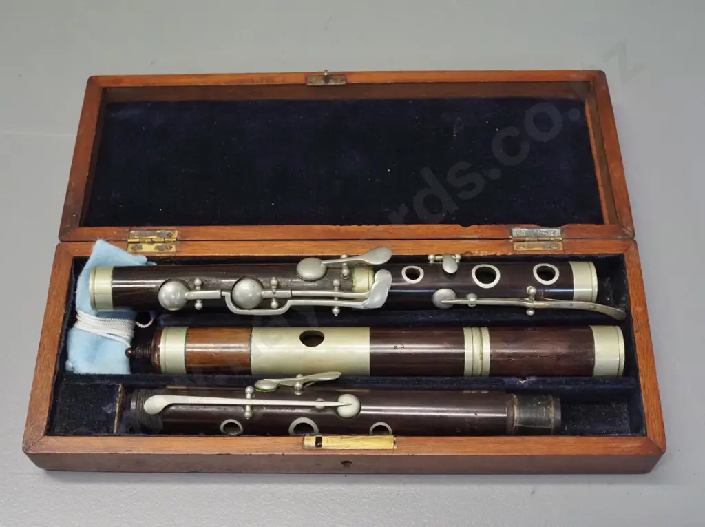 cased vintage wooden flute or fife - may be mismatched parts? Marked Starck London and Begg & Co Sole Agents Dunedin Image 1++