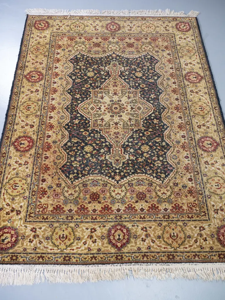 Persian style machine woven wool floor rug - black red and golds L1950 W1410 Image 1++