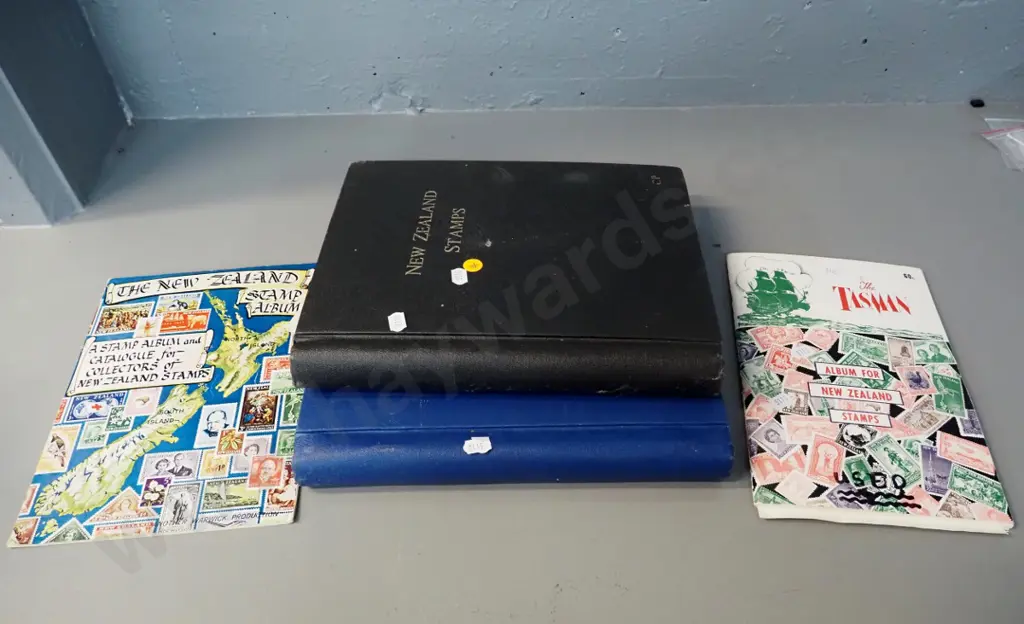 New Zealand stamp albums with partial contents - some staining/mustiness to larger albums, stamps OK Image 1++