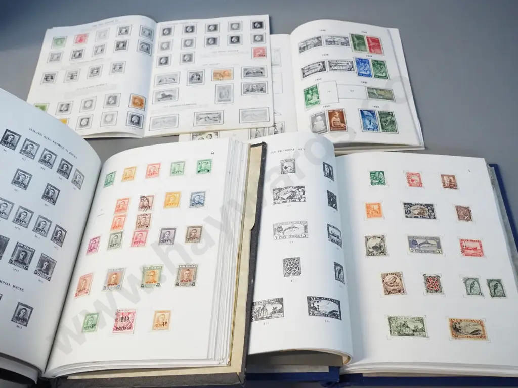 New Zealand stamp albums with partial contents - some staining/mustiness to larger albums, stamps OK Image 1++