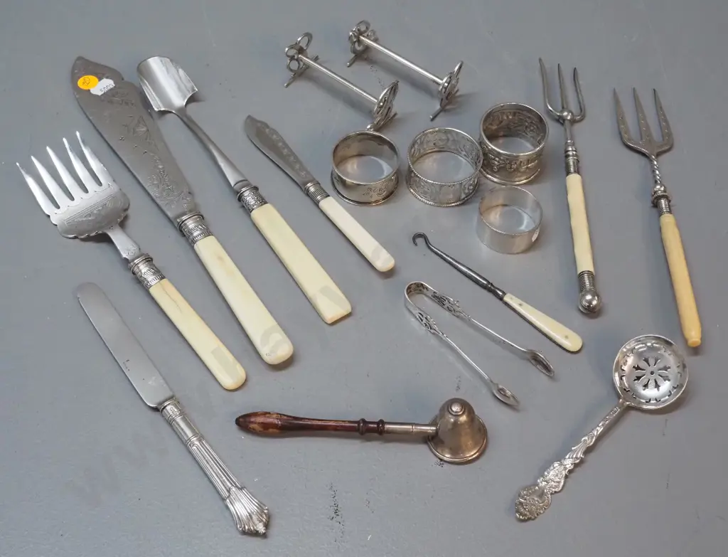 assorted silver items - sterling candle snuffer, napkin ring and child's knife, plated bone-handled servers etc. Image 1++