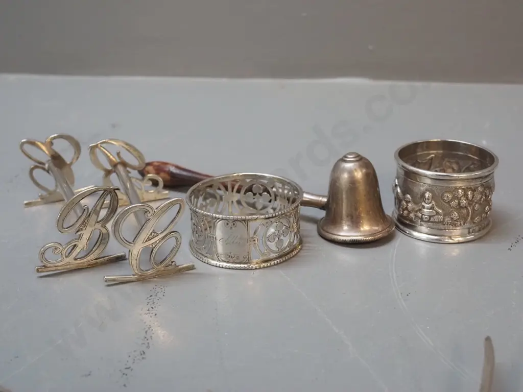 assorted silver items - sterling candle snuffer, napkin ring and child's knife, plated bone-handled servers etc. Image 1++