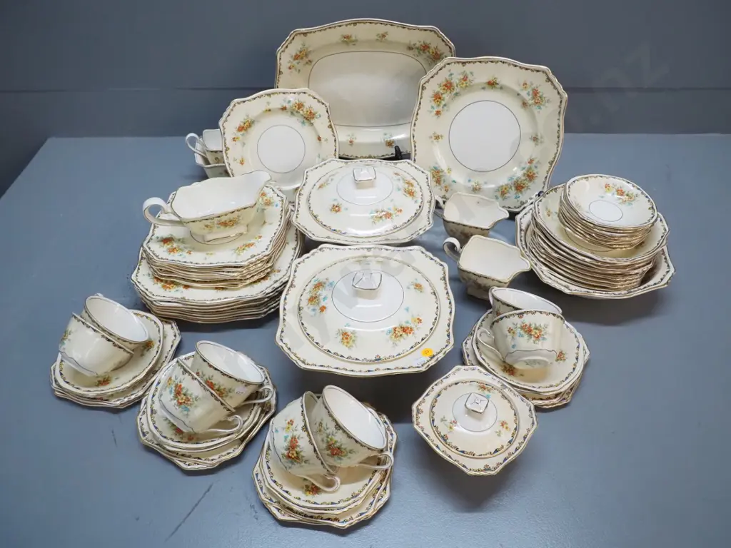 Grimwades hand-finished 8-place dinner set - some staining to a few, cream & sugar both w/obvious repairs Image 1++
