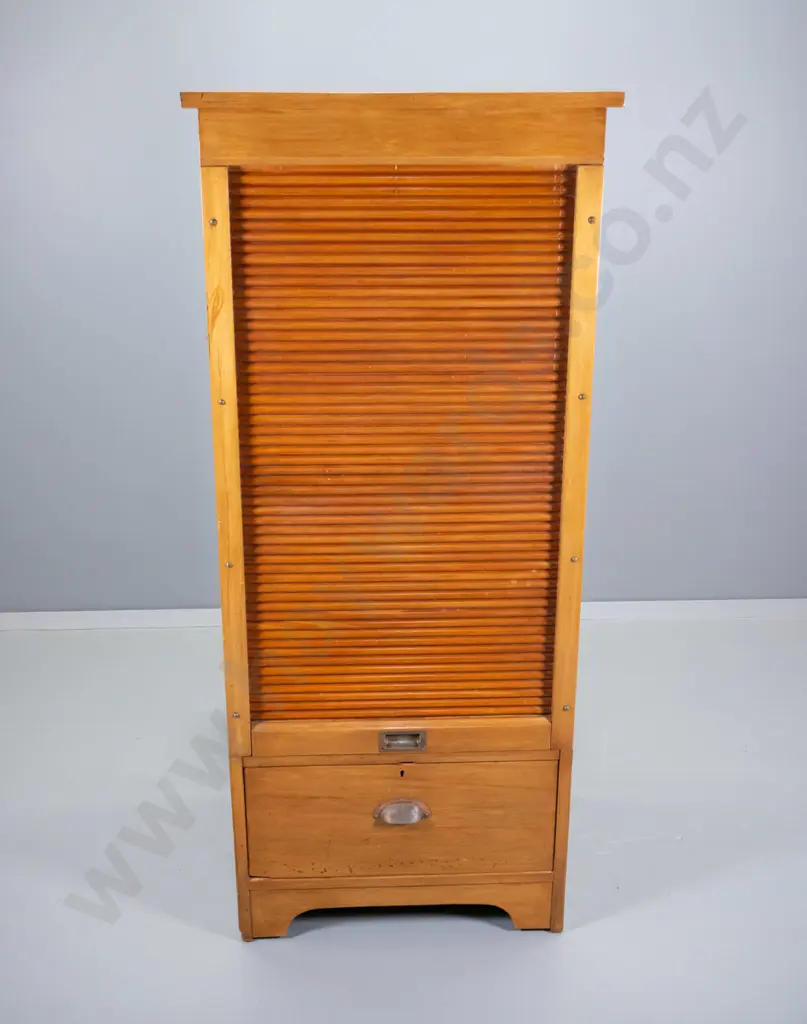 rimu cabinet ex Dunedin Post Office, vertical tambour door, pigeonholes, lower drawer, splits on ends Image 1++