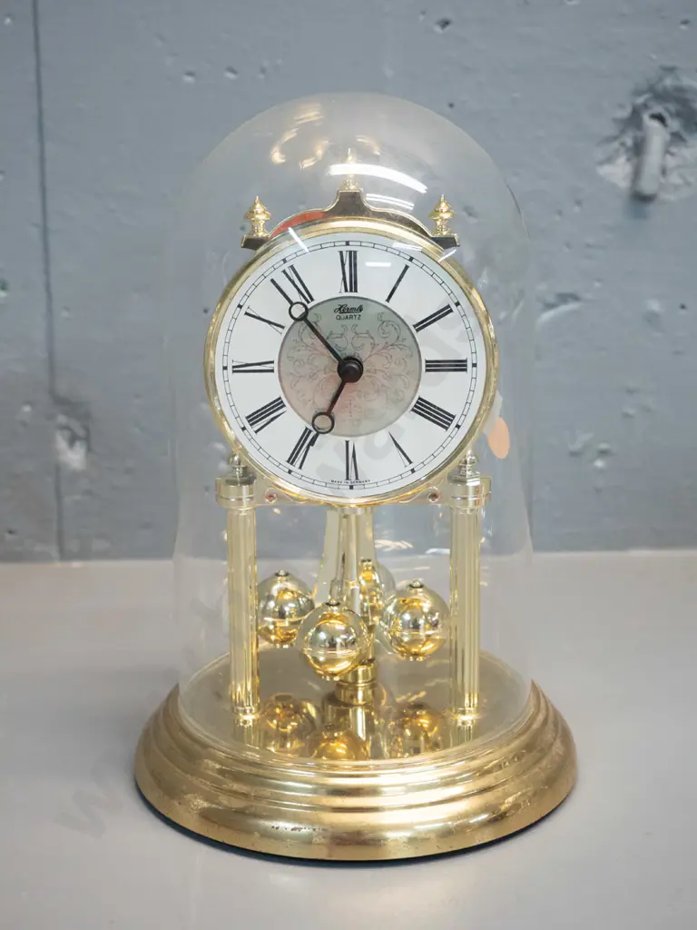 Hermle German plastic and metal quartz movement anniversary clock with glass dome H-230 D-160 at base Image 1++