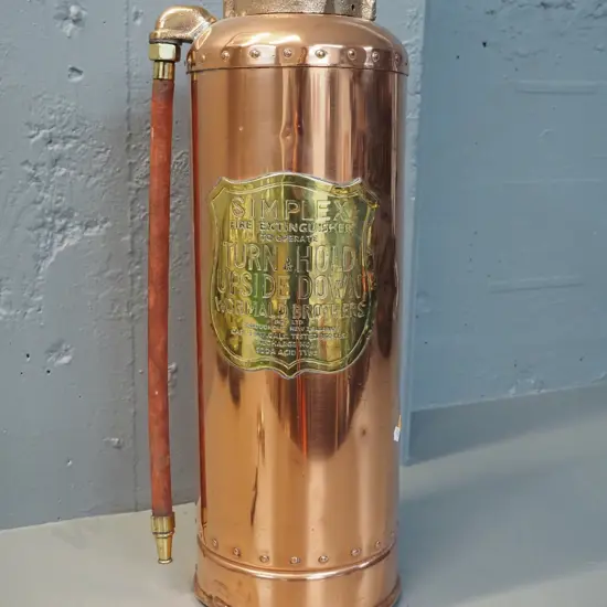 copper and brass fire extinguisher with Simplex / Wormald Bros. NZ plaque - damage/repair to base H-520